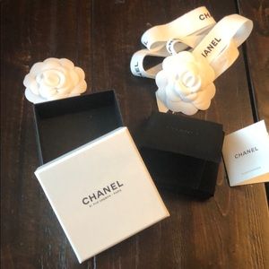 Chanel box, ribbon, camellia for a brooch.